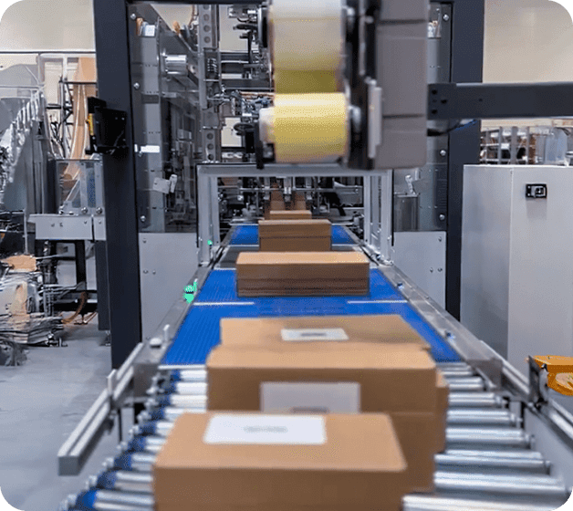 Packed parcels on the Completio shipping belt before courier pickup